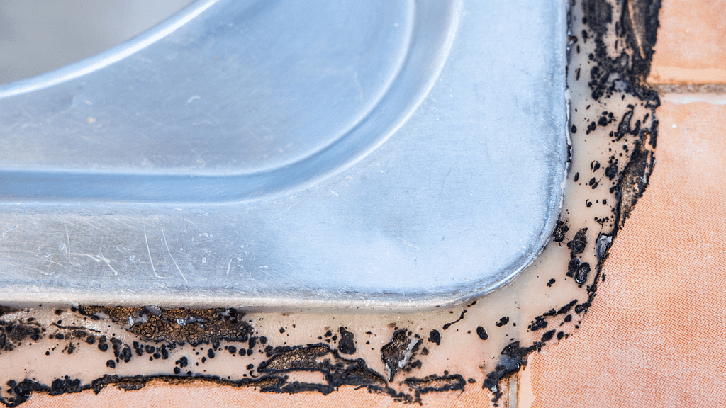 silicone vs caulk applied to different interior surfaces like tile and drywall