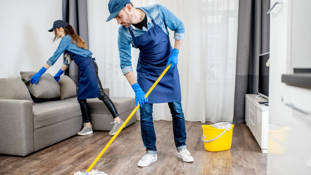 Preparing a home for sale by cleaning, decluttering, and organizing living spaces
