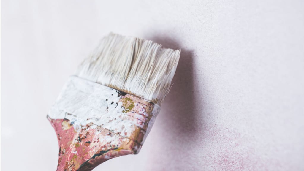 painting walls as part of preparing a home for staging and selling