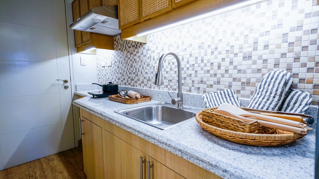 Kitchen backsplash with under cabinet lighting showing upgrading a kitchen on a budget