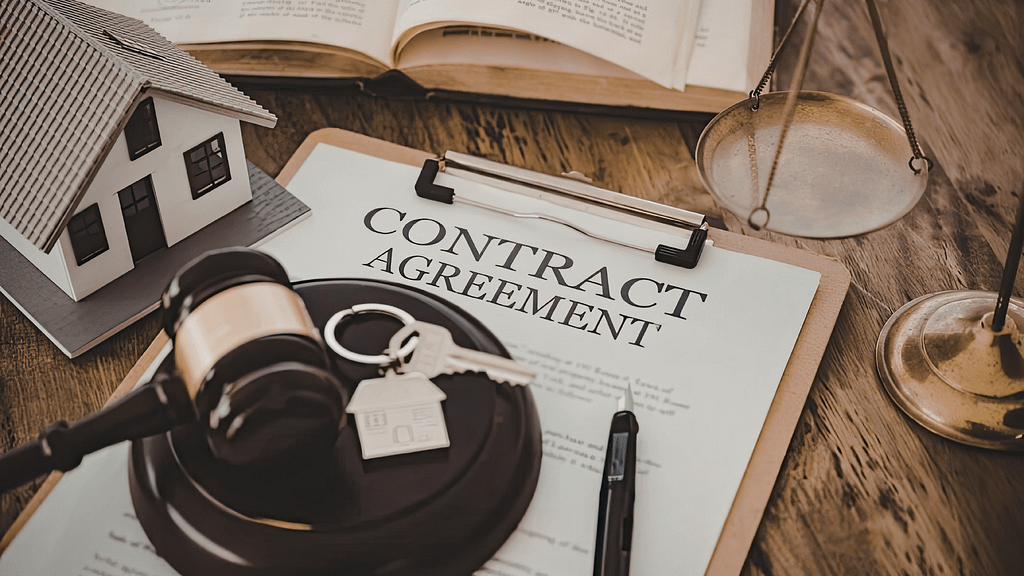 Contract, house keys and property documents representing the process of buying a condo