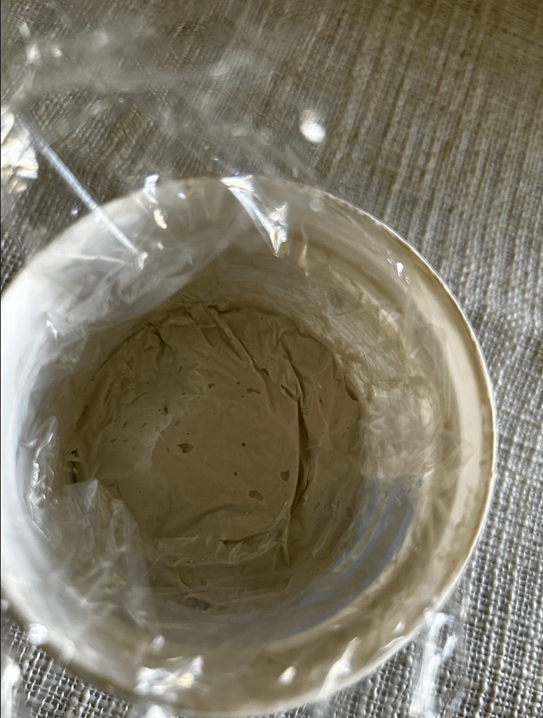 Applying wall filler as part of preparing walls for painting