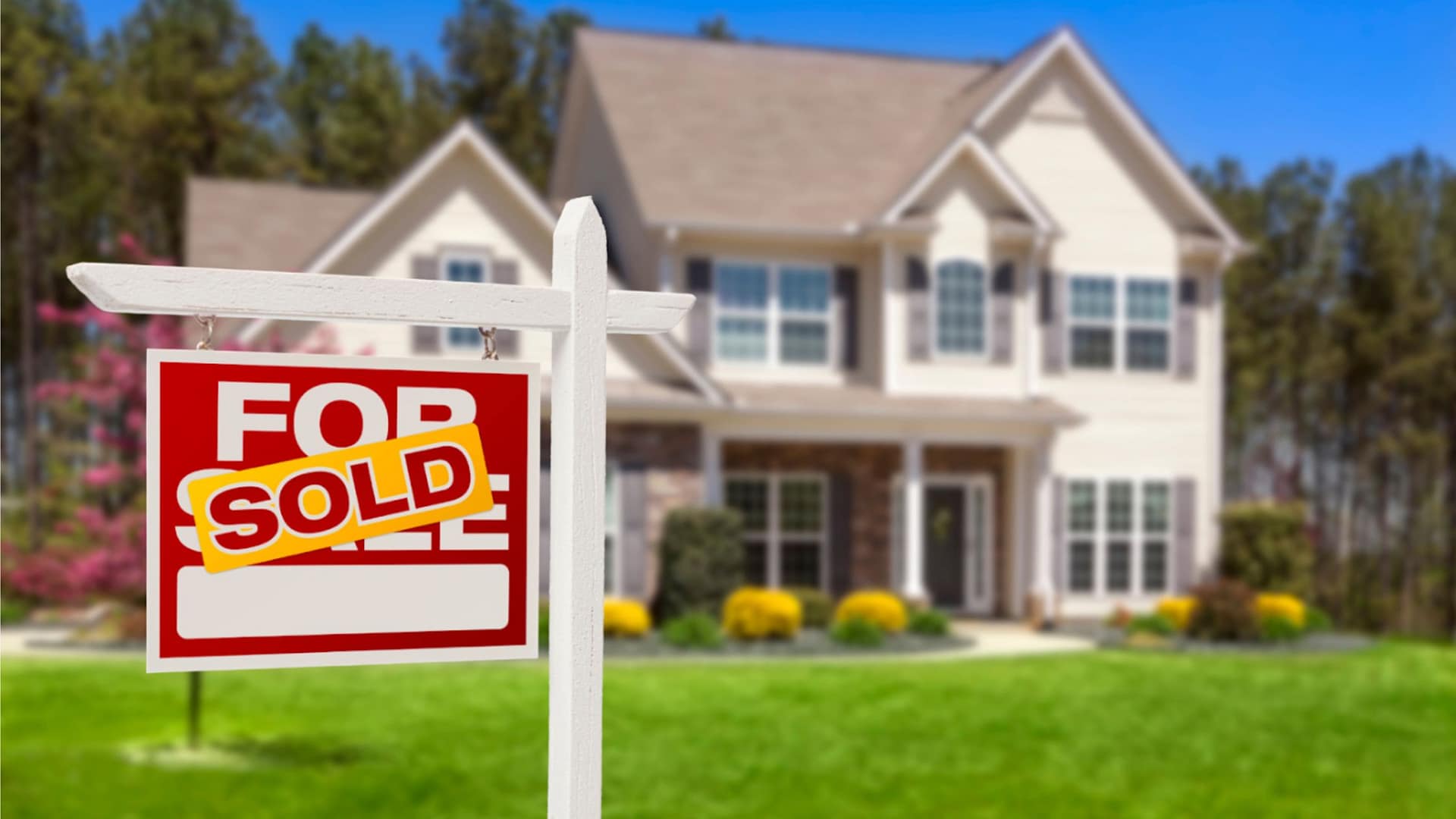 Seller holding house keys after taking the first steps to sell a house